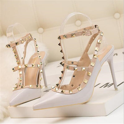 New 10CM woman Sexy nightclub stiletto heels patent-leather metallic rivet hollow Roman fashion sandals